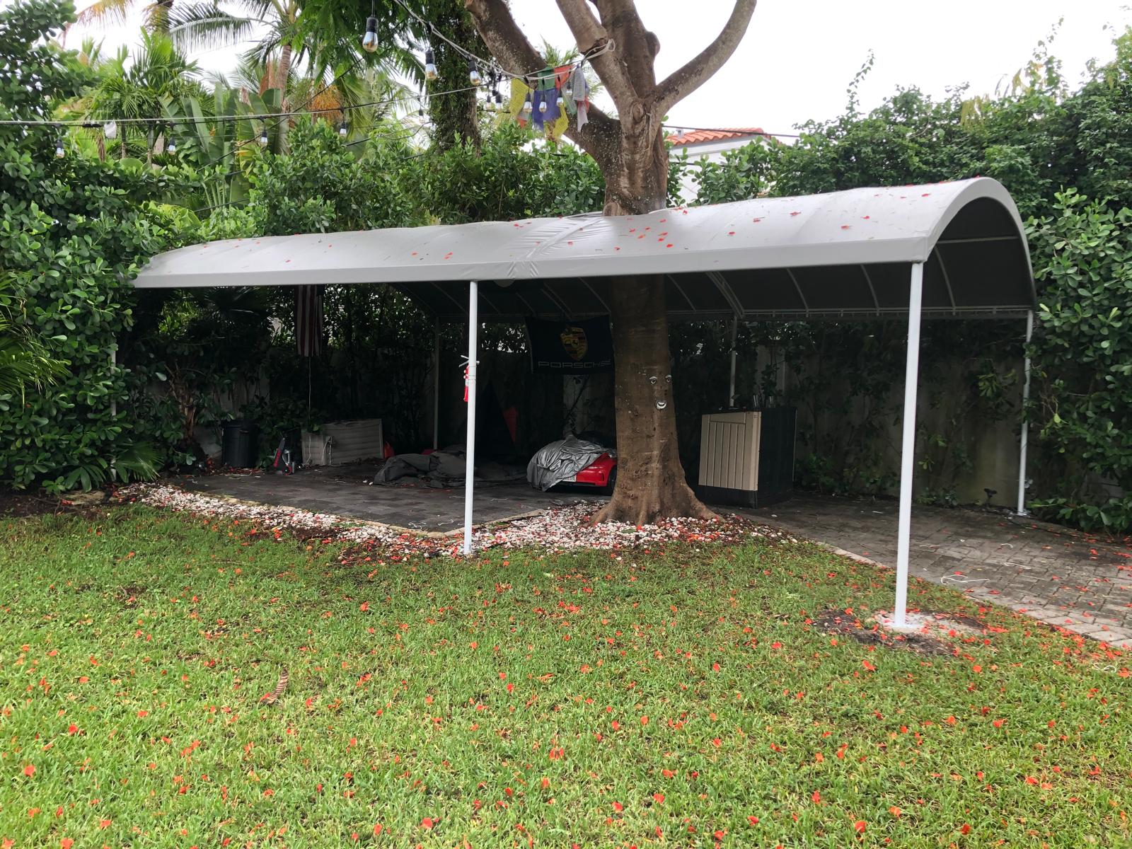 Custom carport fitted around the property's existing landscape